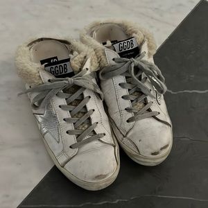 Golden Goose Superstar Sabot shoes.